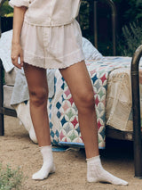 The Eyelet Tap Short in White